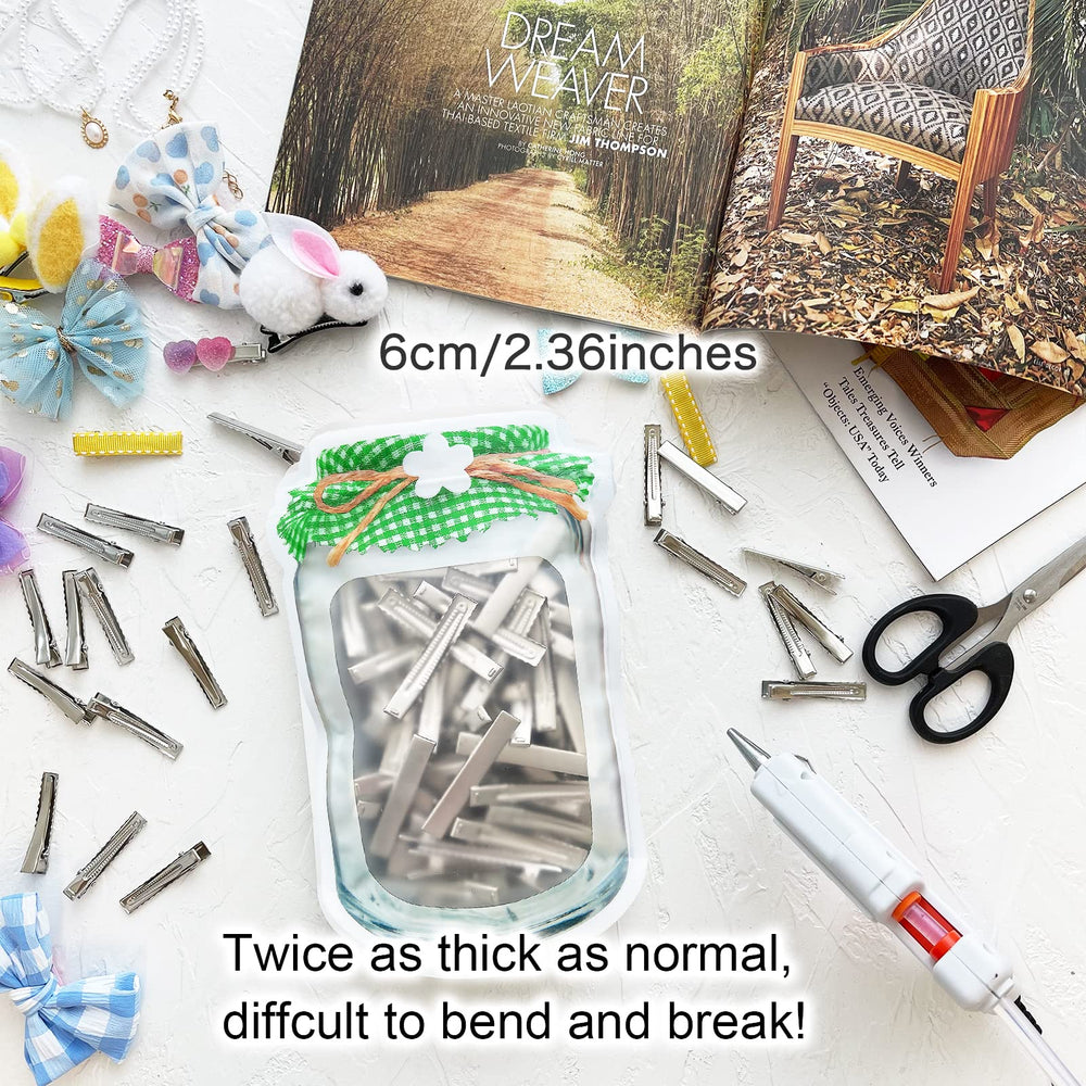 HiJeaton assortment of clips spread on table suggesting craft-ready bulk supply