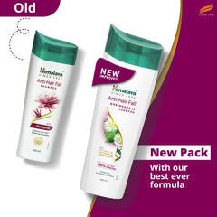 Himalaya shampoo bottle beside chickpea and herbs showcasing botanicals