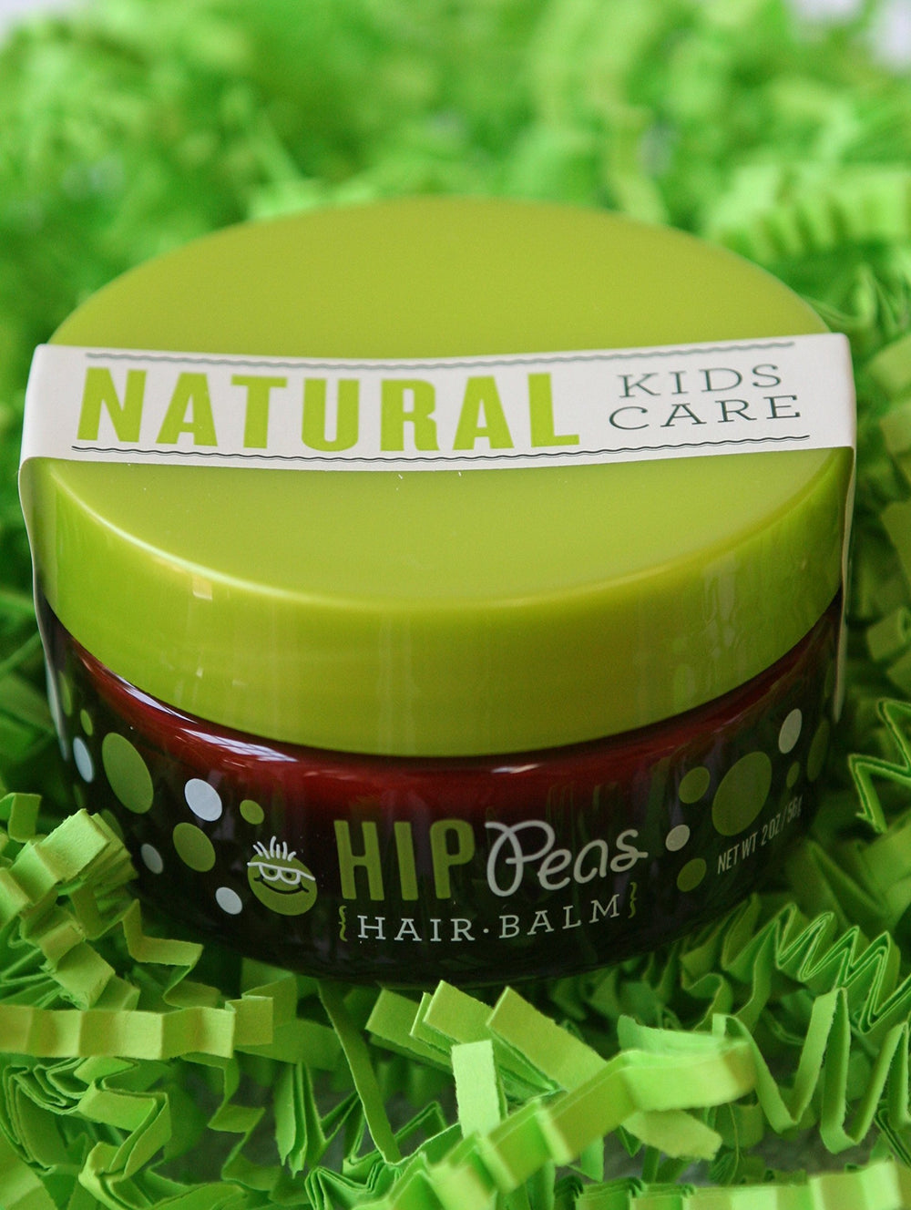 Hip Peas jar on wood table in a family-ready bathroom setting, approachable formula