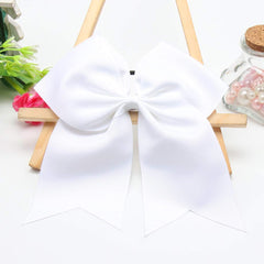 Hipcheer bow in ponytail during cheer practice for visible team look benefit