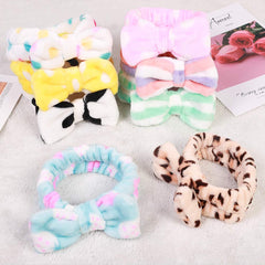 Hishexin headband on hand to show stretch and true size comparison