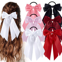 hisial flatlay showing six bow hair ties and outfit coordination benefit
