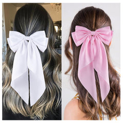hisial bow in high ponytail demonstrating polished look and easy styling