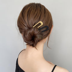 hisial pins used in wedding hairstyle showing decorative accent and polished look