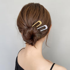 hisial lifestyle shot of woman wearing pins for an elegant finished look