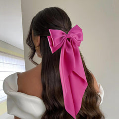 hisial model wearing bow in ponytail, adding instant polished style