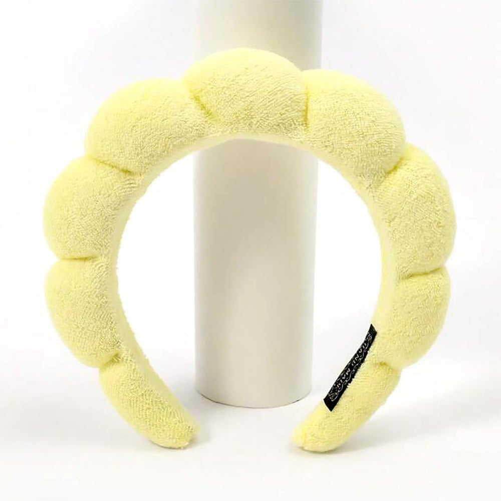 HitModa headband worn while washing face demonstrating secure hold and convenience