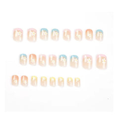 Hkanlre close-up of flower detail on nail highlighting delicate design