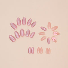 Hkanlre close-up of medium bow detail on almond nail highlighting cute design