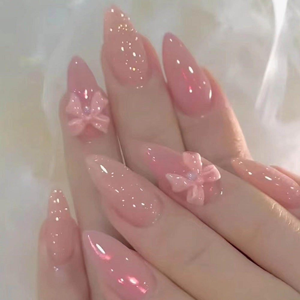 Hkanlre front packaging showing 24PCS pink bow nails for instant manicure