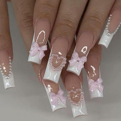 HNUIX charms applied on an acrylic nail showing salon-style finished look