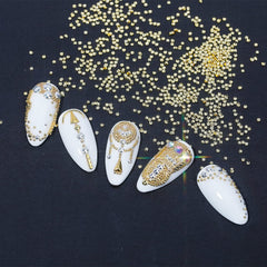 HNUIX beads applied on a nail tip showing finished 3D manicure effect