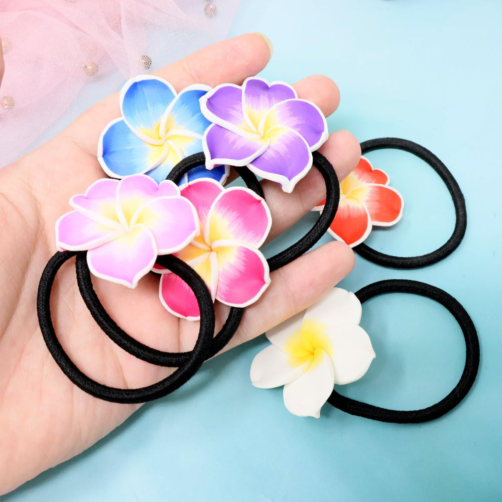 Honbay floral hair tie anchoring a low bun, neat comfortable hold
