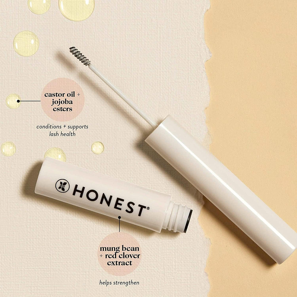 Honest Beauty gel small tube beside fingers showing travel-friendly size and portability benefit