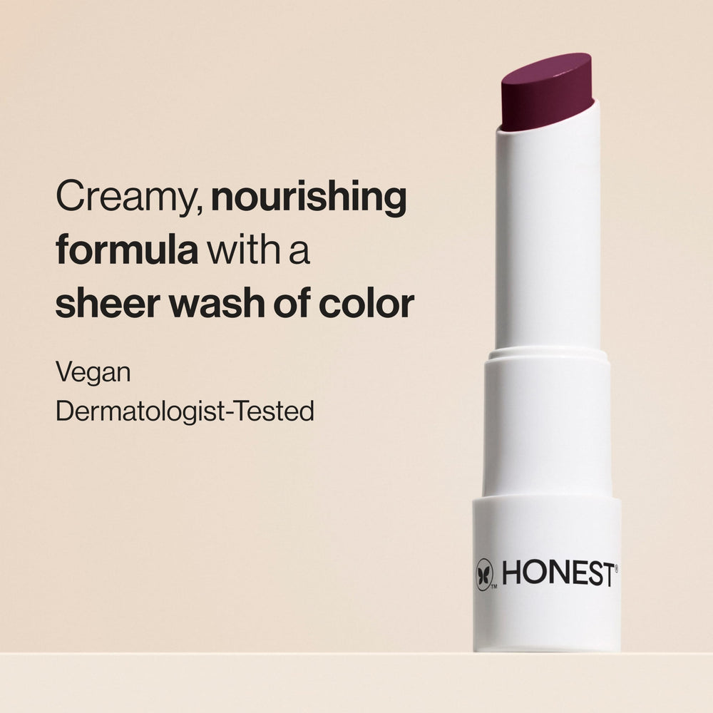Honest Beauty Plum Drop creamy balm texture close-up demonstrating smooth glide and moisture