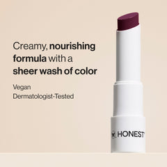 Honest Beauty Plum Drop creamy balm texture close-up demonstrating smooth glide and moisture