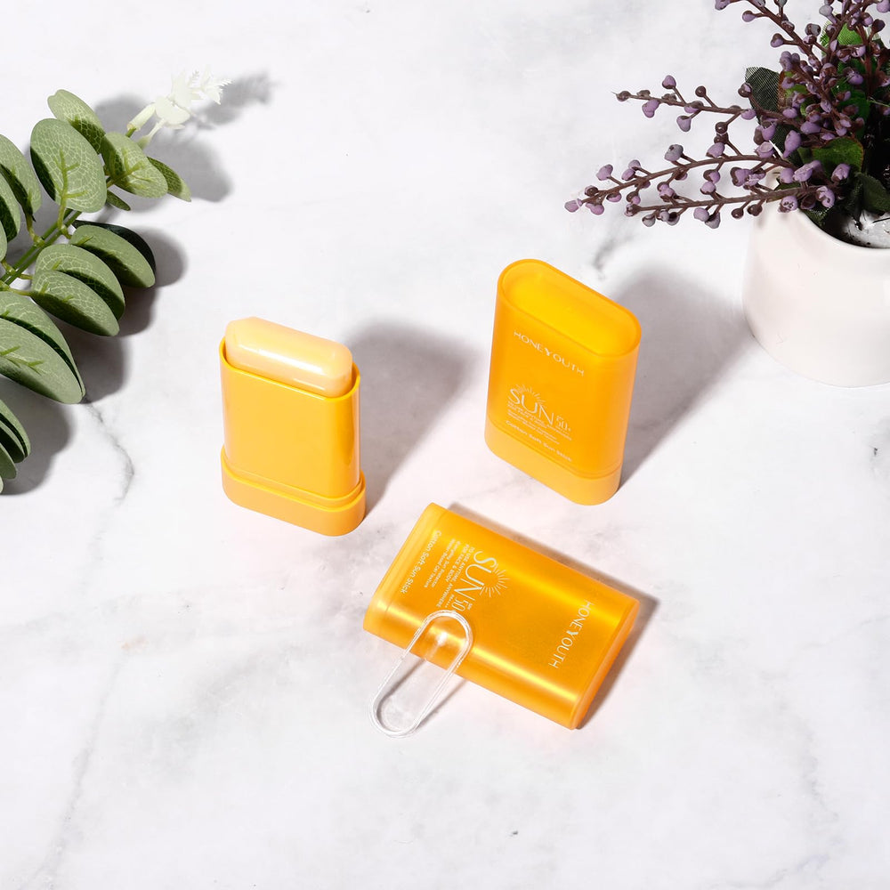 Honeyouth label and ingredient list closeup highlighting soothing extracts and broad spectrum SPF
