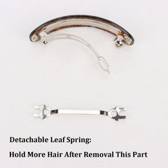 Hotalisona barrette worn in a half-up hairstyle for neat daywear