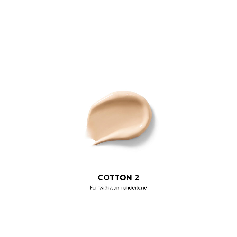 Hourglass concealer texture close-up highlighting blurring microspheres benefit