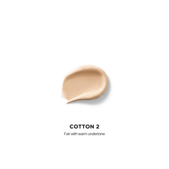 Hourglass concealer texture close-up highlighting blurring microspheres benefit