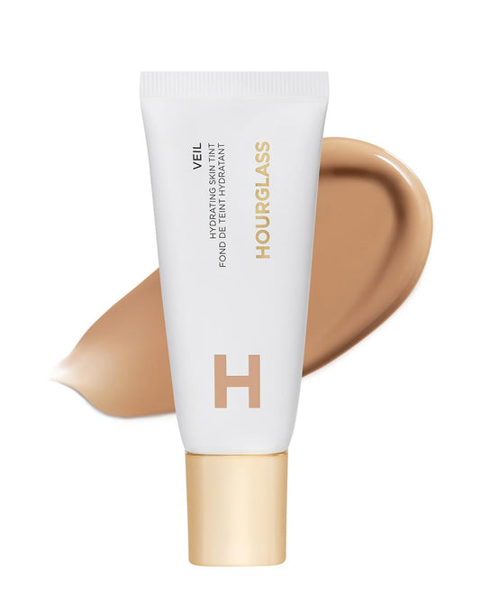 HOURGLASS front bottle view showing sleek packaging and dewy finish benefit