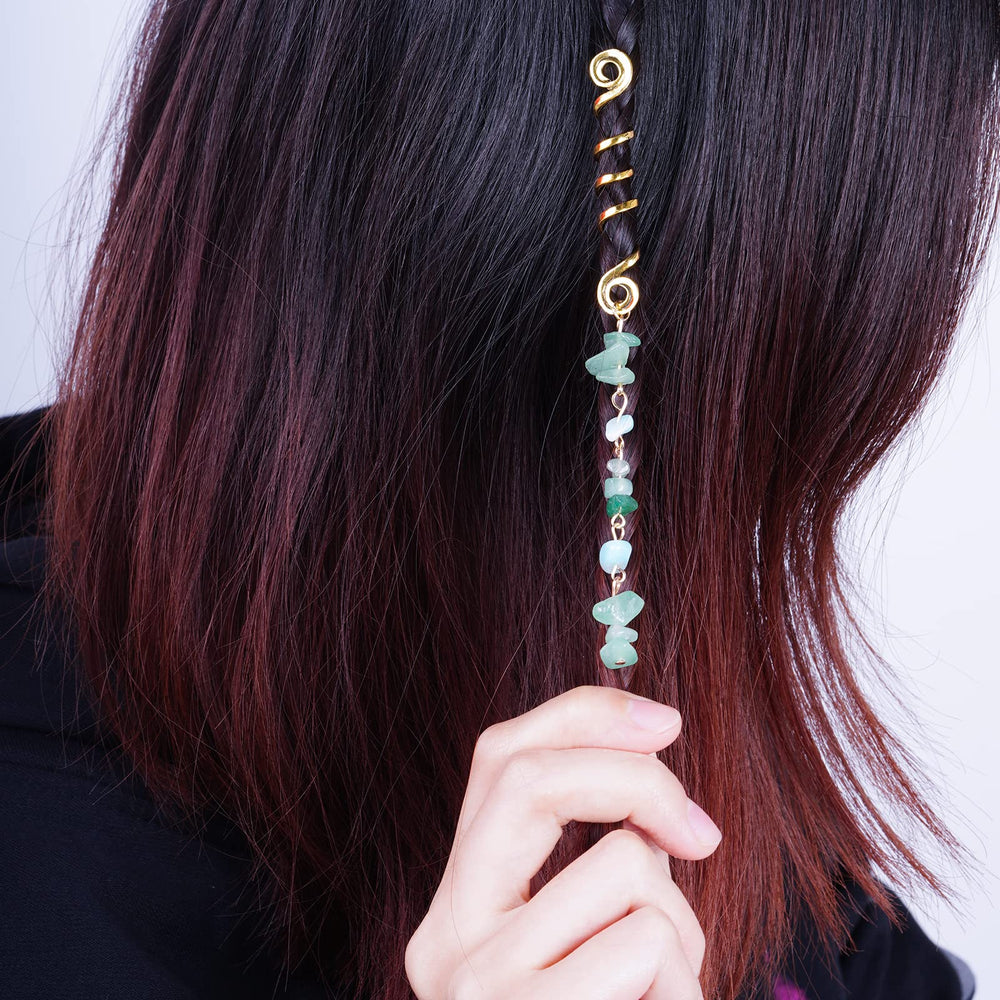 hoyuwak size comparison with coin illustrating compact charms and gentle weight on hair