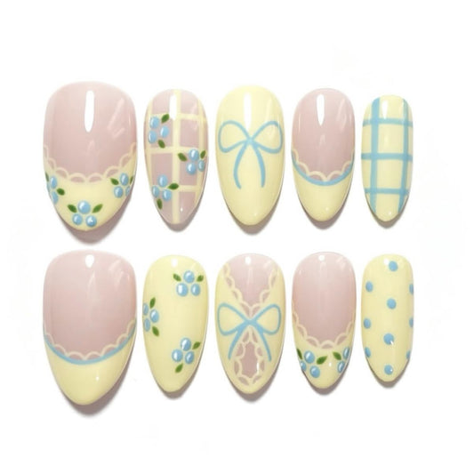 HPYFOI front packaging showing butter yellow press-on nails set and benefits