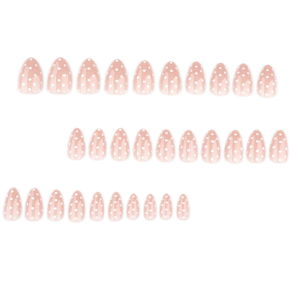 HPYFOI close-up of glossy short almond nail with white polka dots and precise finish