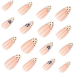 HPYFOI top view of yellow French tip with polka dots demonstrating consistent pattern and finish