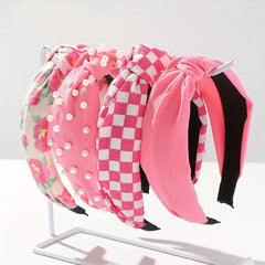 Huachi front packaging showing four hot pink headbands and value pack benefit
