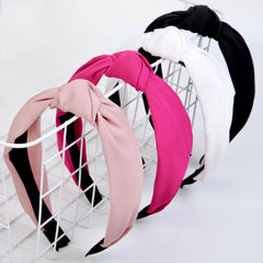 Huachi headbands front view showing four colors and secure fit benefit