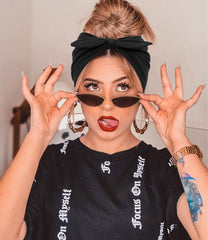 Huachi headband on model in casual outfit showing style and hands‑free hair benefit
