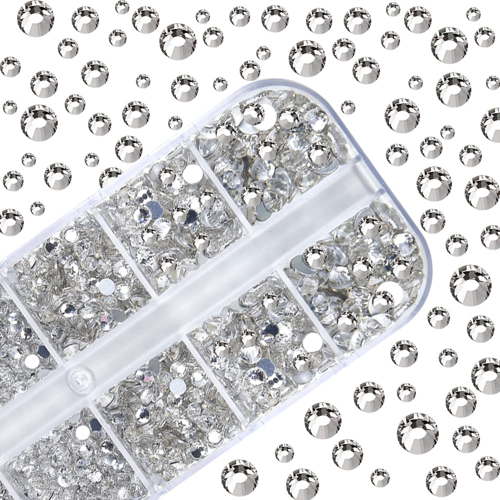 HUETFAT rhinestones being applied to a manicure for accurate, neat decorating