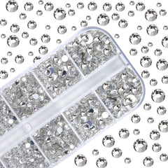 HUETFAT rhinestones being applied to a manicure for accurate, neat decorating