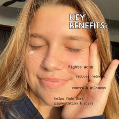 HumanKINDglow heart patch applied to cheek, protects blemish and reduces redness
