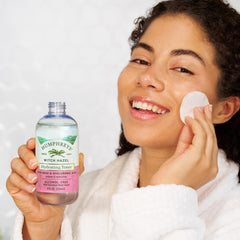Humphreys bottle beside wild-harvested witch hazel branches highlighting ethical sourcing