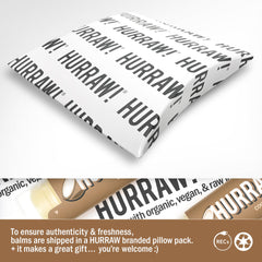 HURRAW! coconut balm texture closeup highlighting smooth non‑grainy finish benefit
