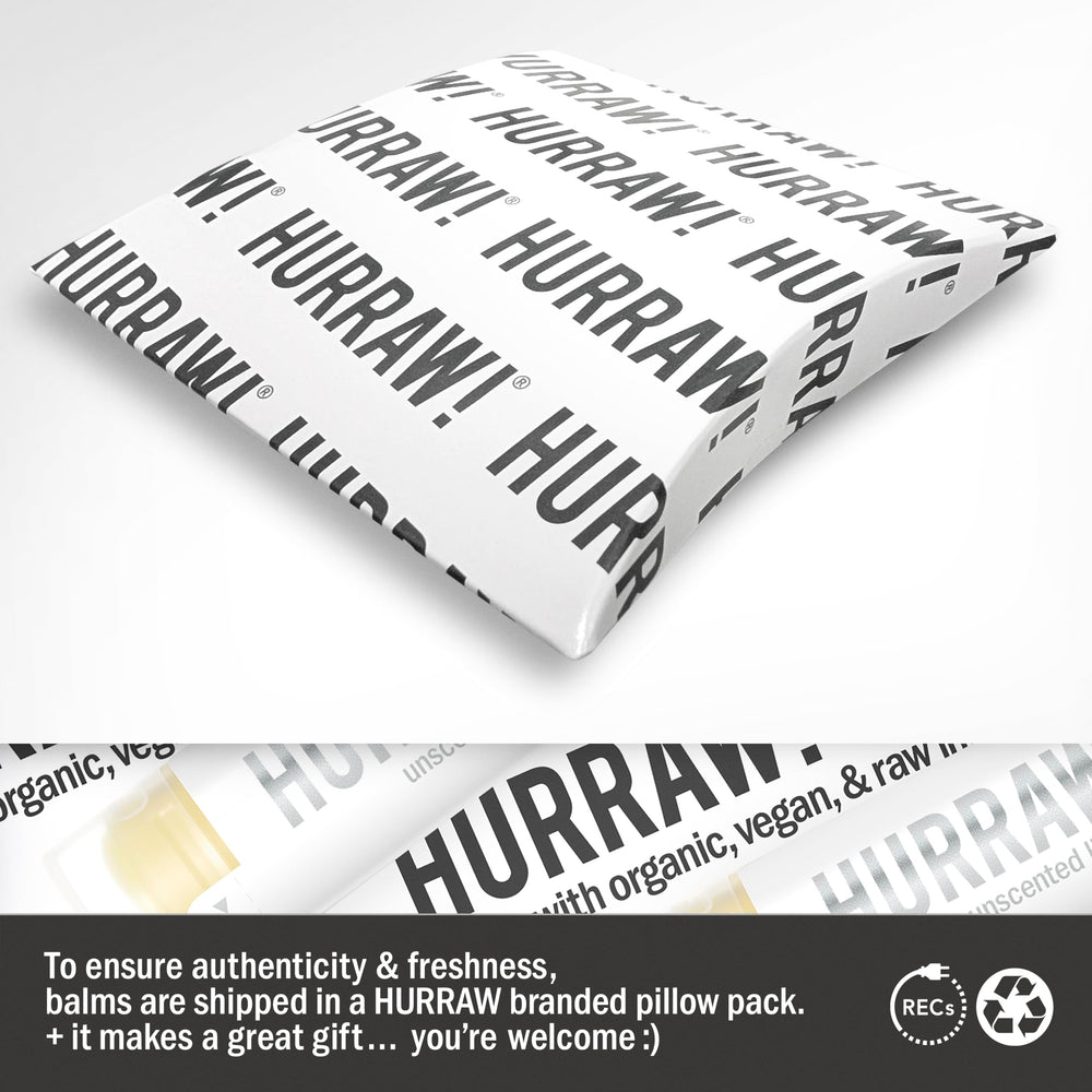 HURRAW! tube held in hand showing size and portability benefit for daily use