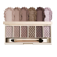 Hxssll palette open front showing six cool mauve grey shades and mirror benefit portability