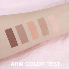 Hxssll brush swipe across pans showing soft matte texture and even pickup