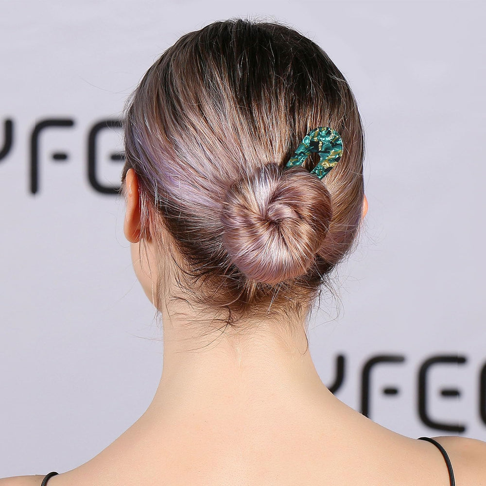HYFEEL in a wedding updo demonstrating polished look for special occasions