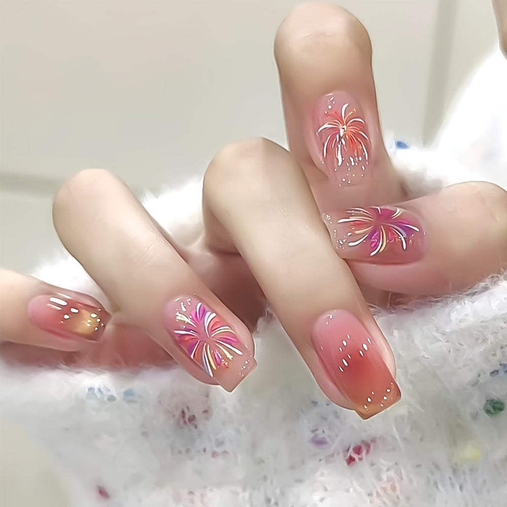 IDDFEVE lifestyle image of party manicure featuring glitter fireworks for celebration-ready nails