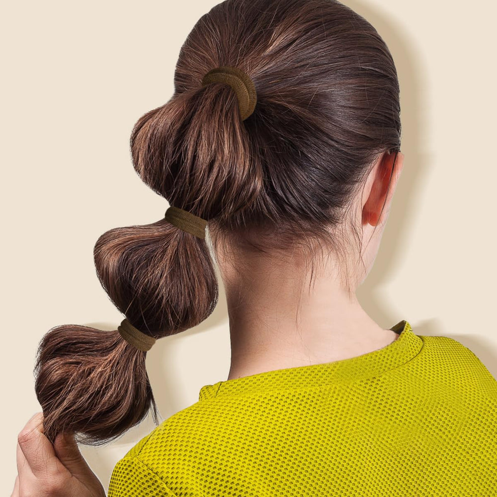 IKOCO woman jogging with ponytail showing sweat-proof, stay-put benefit