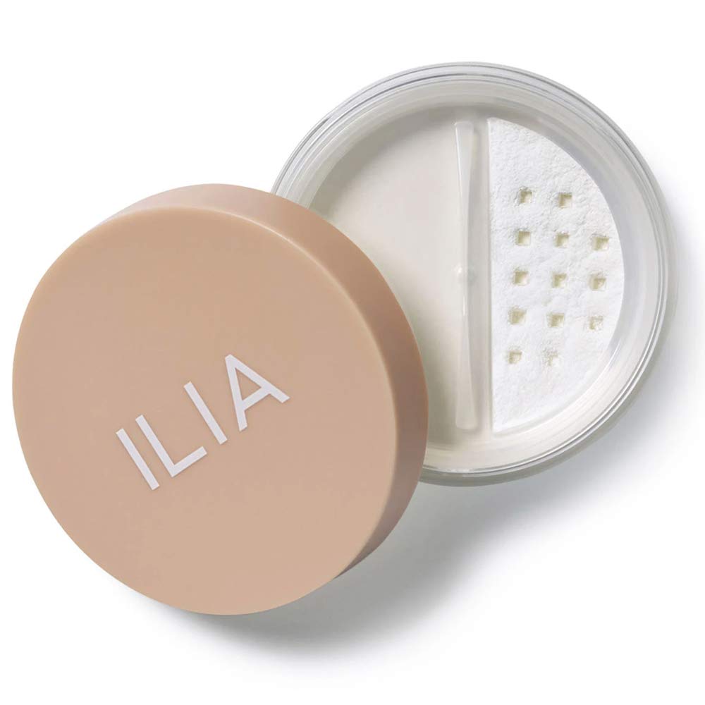 ILIA front packaging showing translucent loose powder and compact benefit of sleek storage