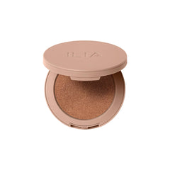 ILIA compact front view showing warm golden bronze shade and sleek packaging benefit easy identification