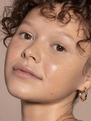 ILIA split-face before and after showing smoothing and sheer coverage benefit