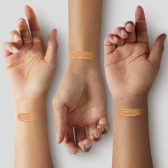 ILIA Ora ST6 swatch on forearm showing warm undertone match and coverage
