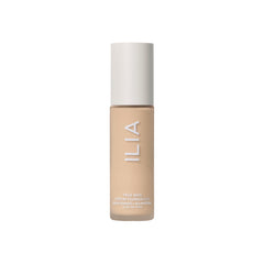 ILIA bottle styled on vanity to convey everyday skincare-makeup routine benefit