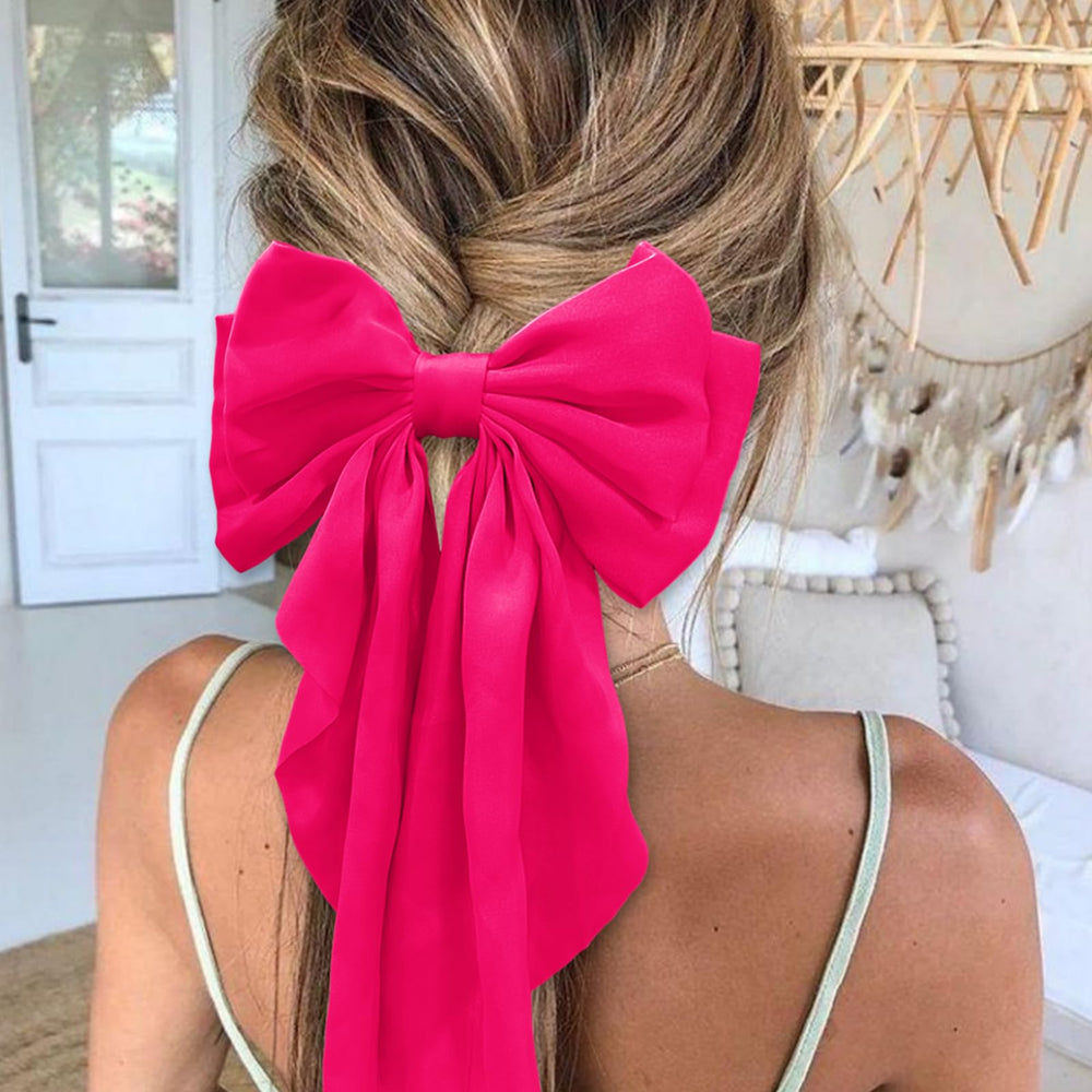 illpta bow clipped in hair demonstrating style and everyday use