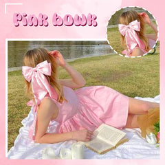 illpta half-up hairstyle with pink bow showing polished finish